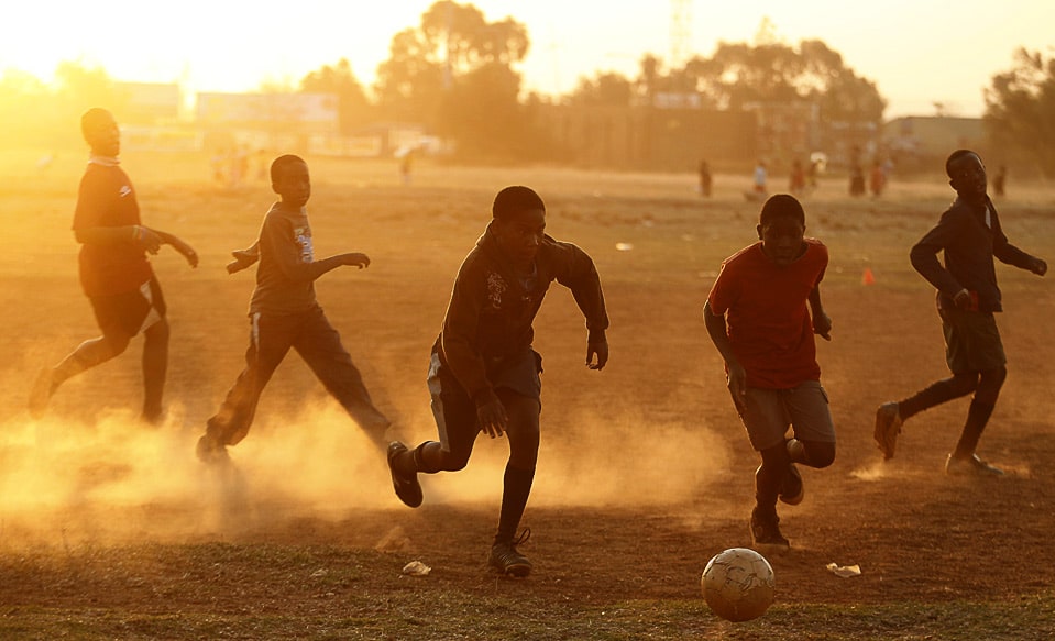 Playing Soccer Football