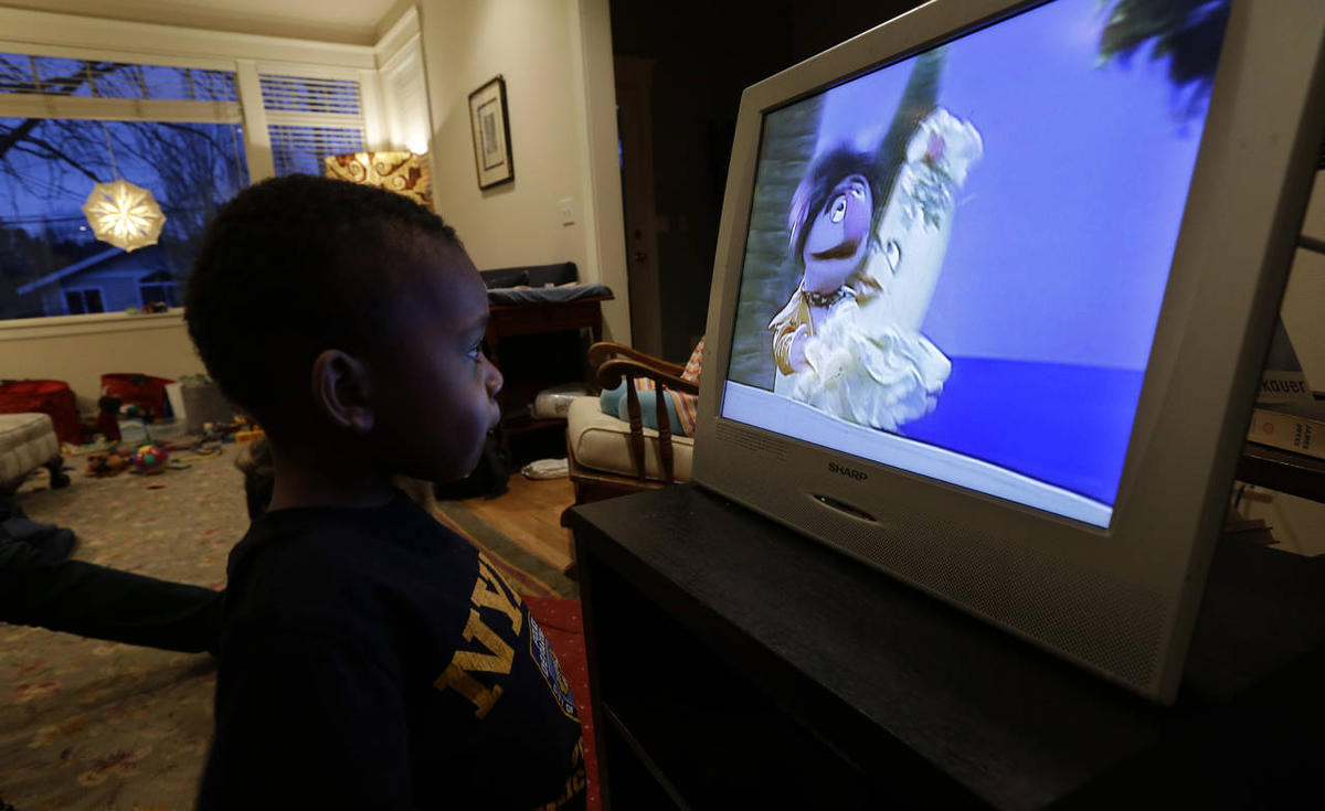 child watching TV-unsupervised by Nigerian parent