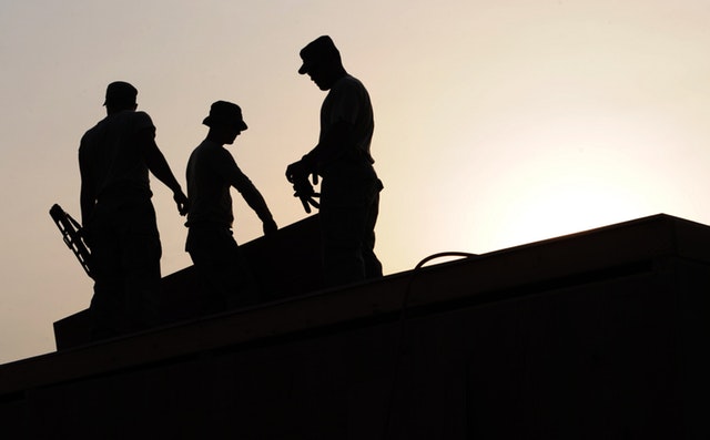 workers construction site hardhats 38293