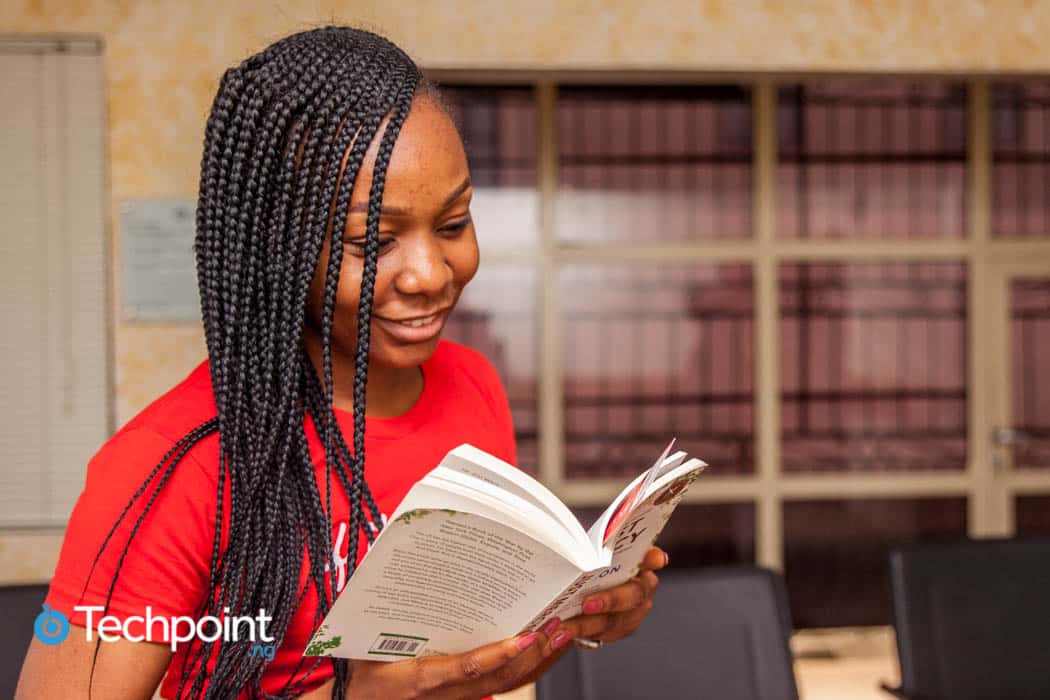 Tobi Eyinade reading a book