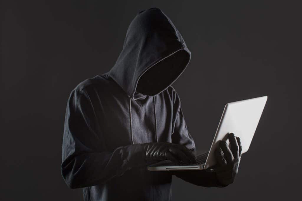 Beryl TV side-view-male-hacker-with-gloves-laptop-1024x682 German company settles $220m South Africa bribery probe  Techs 