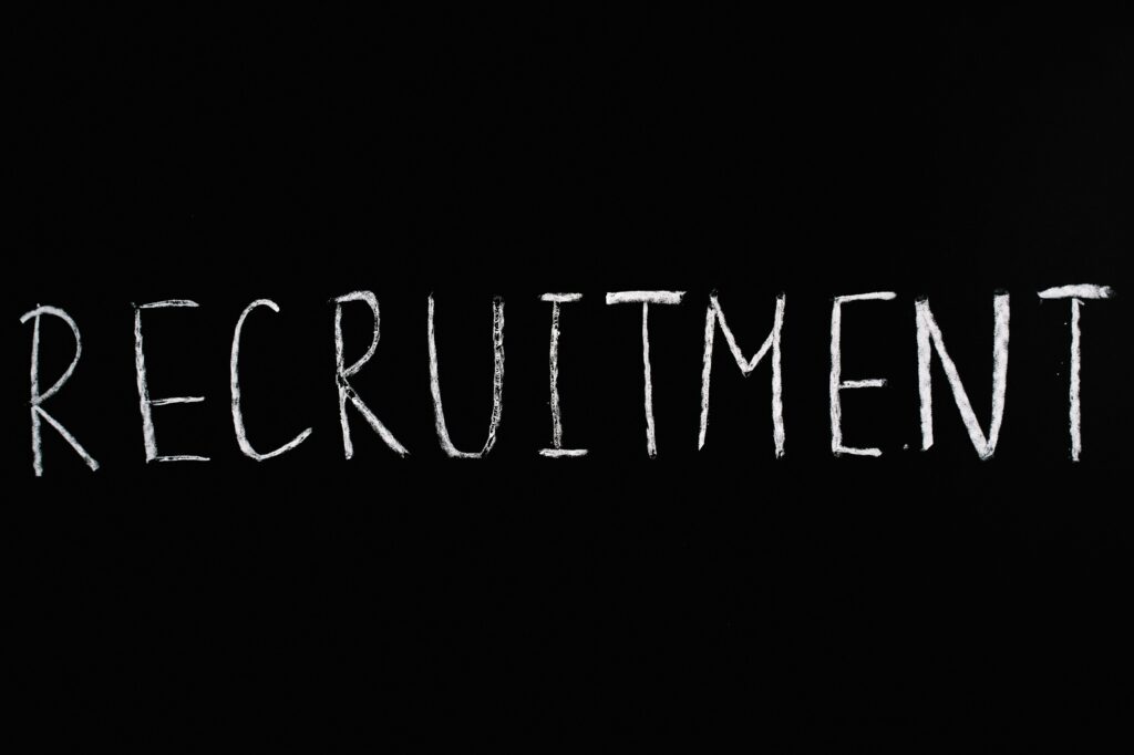 Recruitment Lettering Text on Black Background
