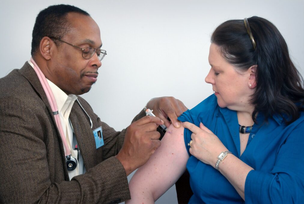 Doctor treating a patient