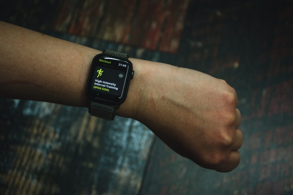 A smartwatch on a hand showing a workout goal