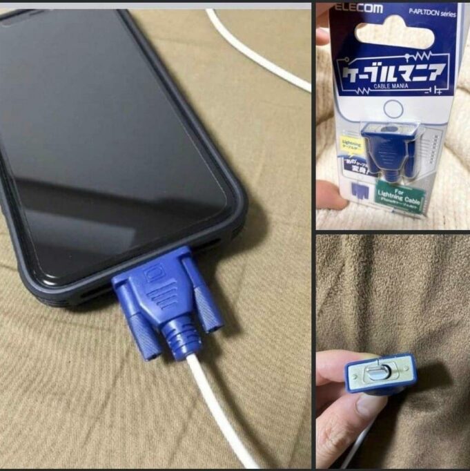 An image of a lightning cable disguised as an old VGA cable being plugged into an iPhone.