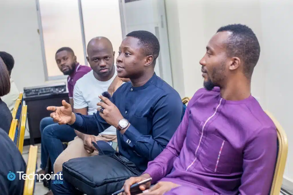 A member of the audience asking questions at Pitch Friday