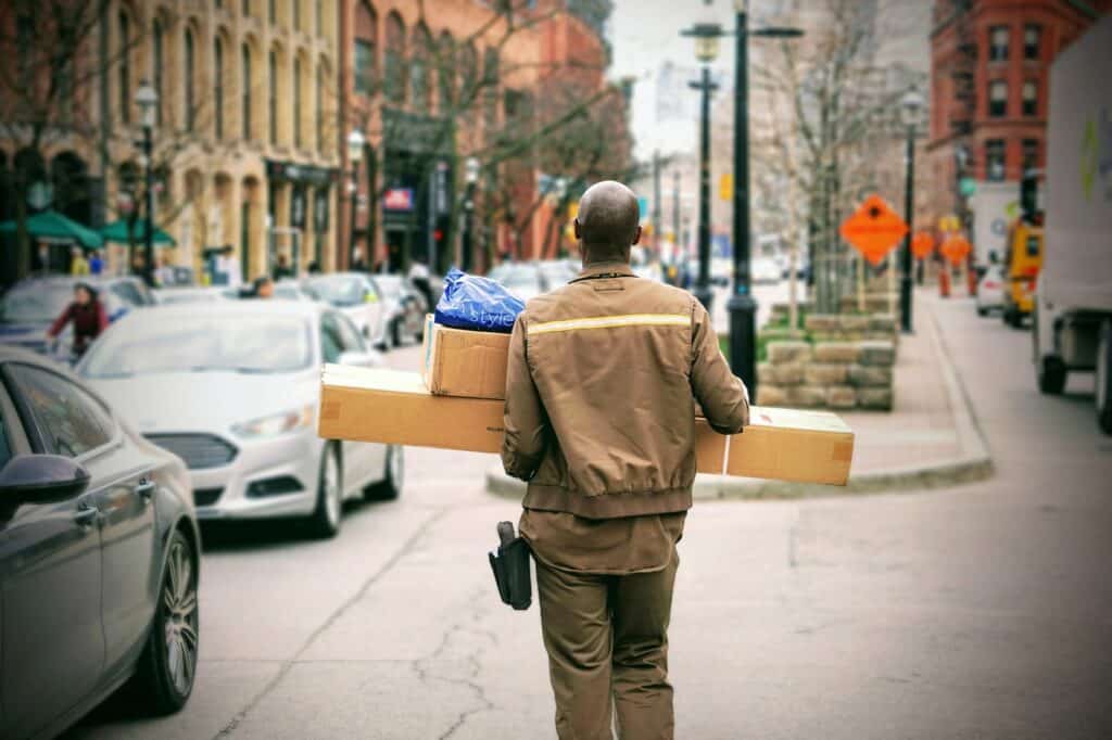 Man carrying several boxes