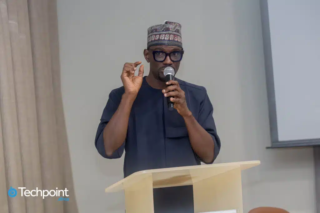 Efemena Ogie, Head of Partnerships at Moniepoint, delivering the keynote address. 