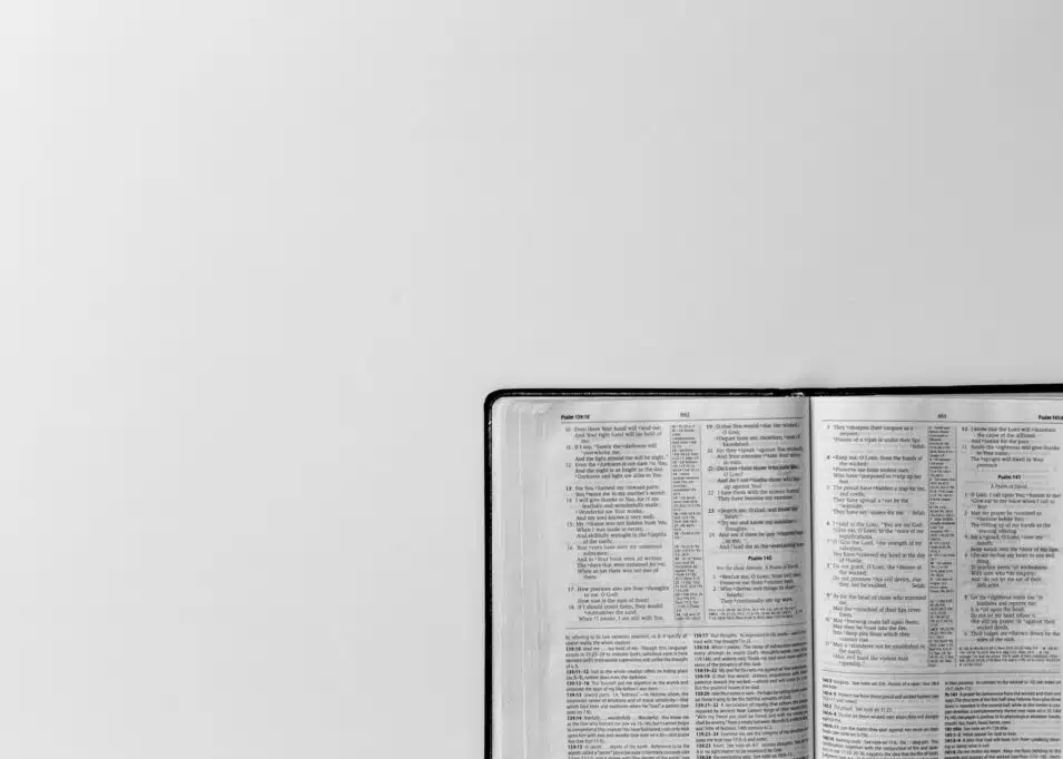 Nigerian pastors integrating AI in ministry with spiritual considerations Bible on a table