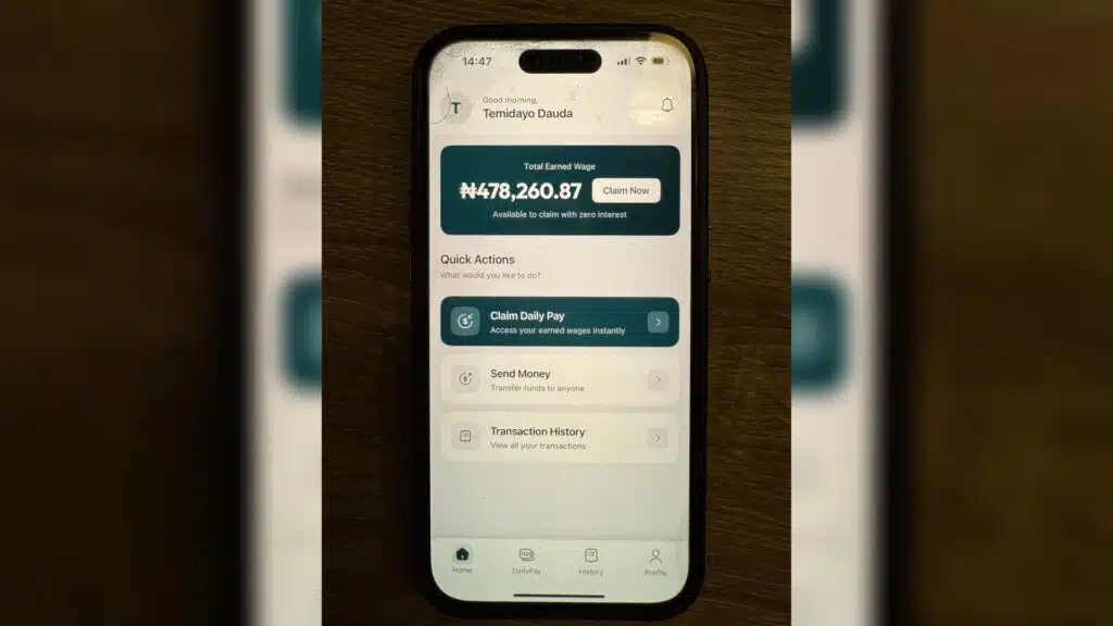 This startup wants to help Nigerians receive their salary daily 1 Picture of a phone with the DailyPay app opened on screen techpoint.africa